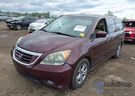 2009 Honda Odyssey Touring from USA, damaged, VIN 5FNRL38929B037150